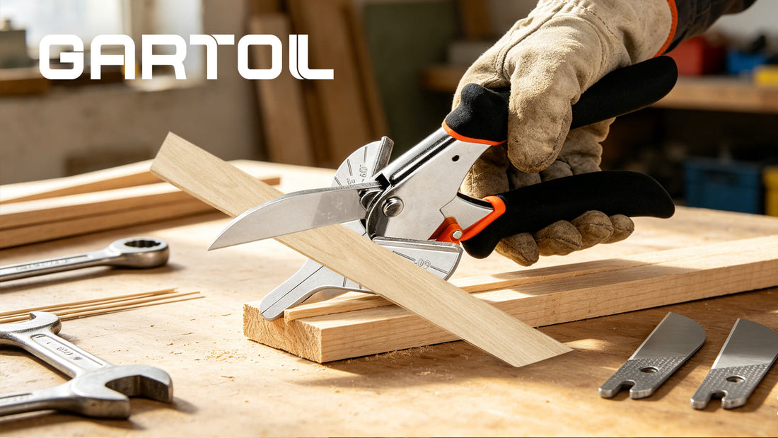 Cutting baseboards with a miter box and hand saw