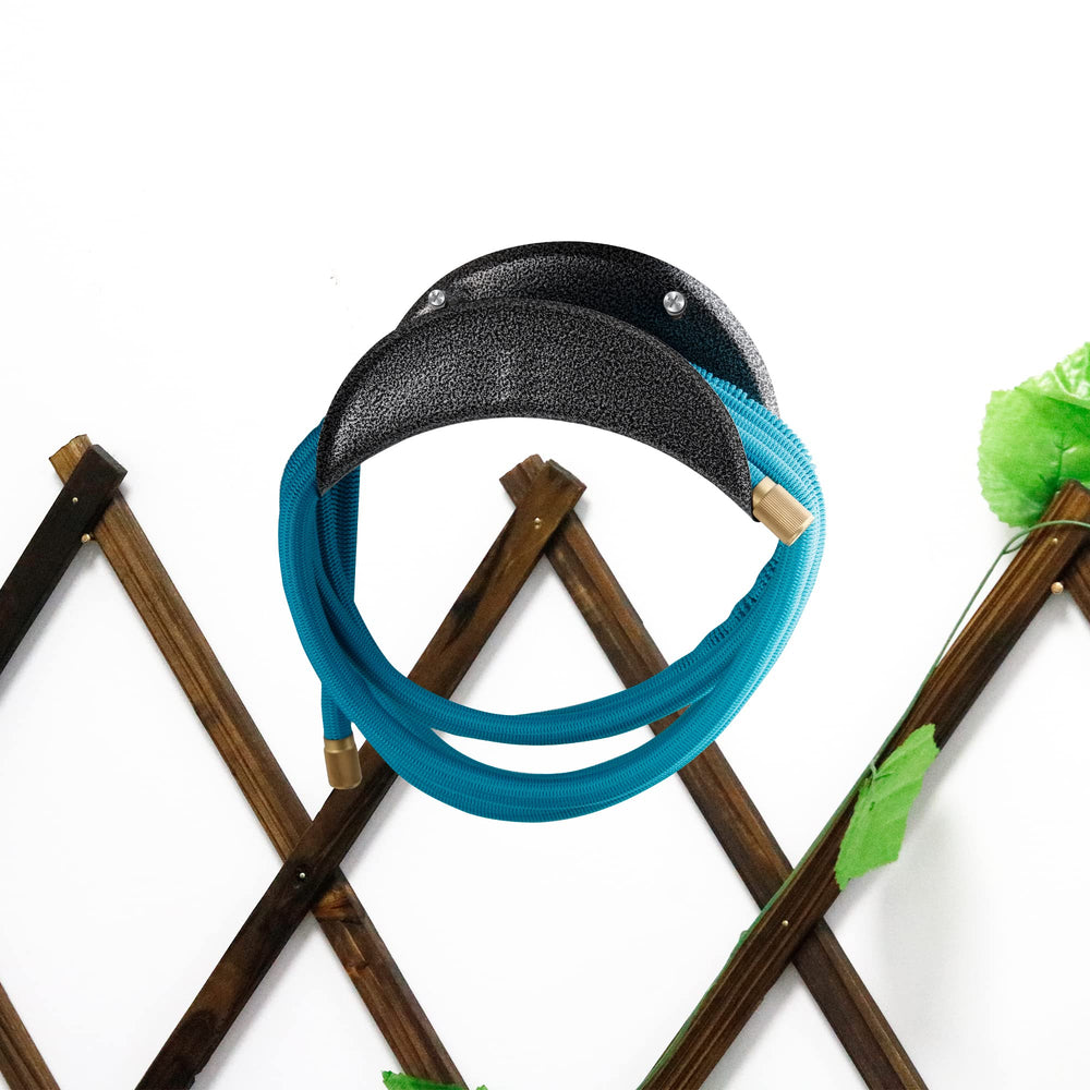 GARTOL wall-mounted garden hose holder holding blue hose on wooden fence
